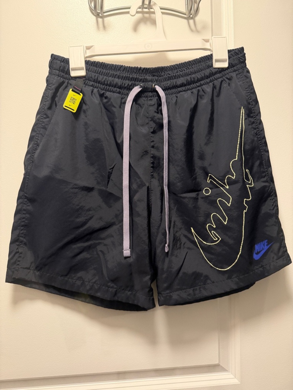 Nike Black Athletic Shorts with Neon Yellow Script and Lavender Drawstring